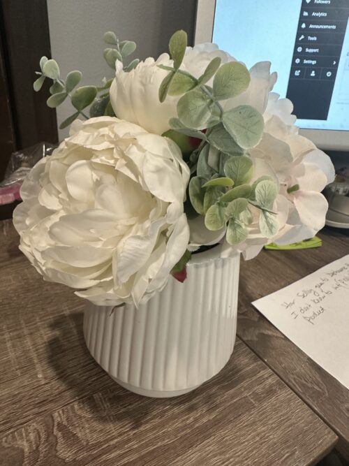 white and green florals in white vase for table settings the wedding marketplace